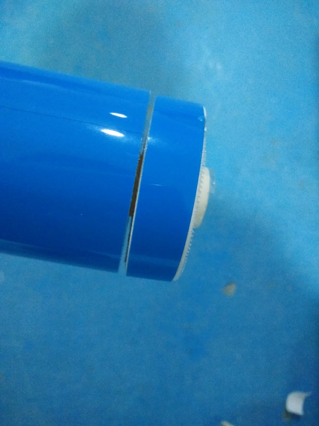 Bonded membrane waste edge near the central tube