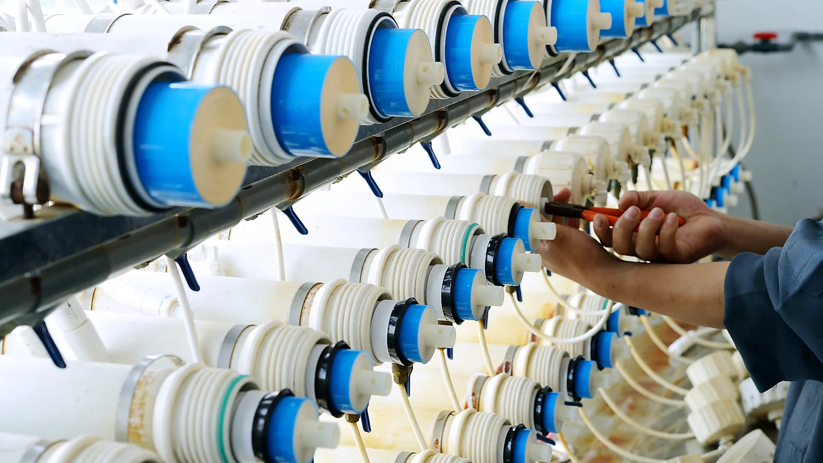 RO membrane sample elements undergoing controlled performance testing